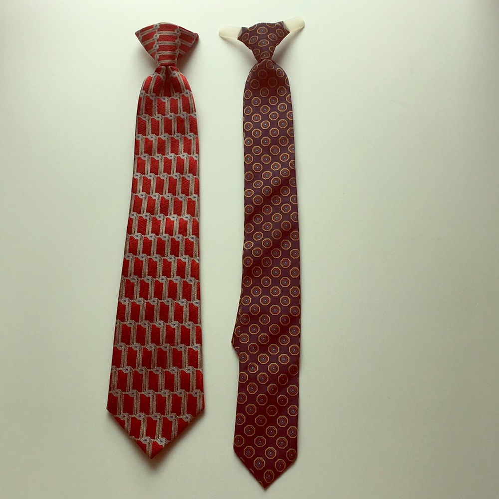 Set of two boys’ clip-on ties.